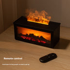 Small electric fireplace with flames and remote control on a wooden surface.