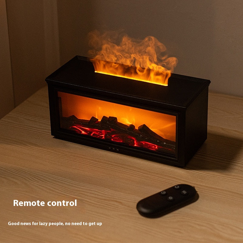 Small electric fireplace with flames and remote control on a wooden surface.